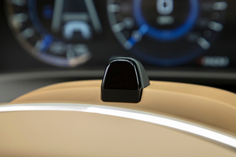 Sensors behind the steering wheel track head movement and eye gaze